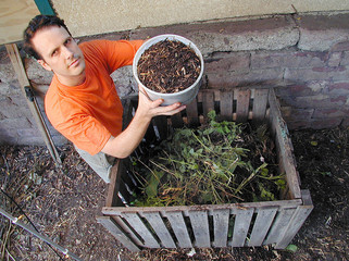 Man with compost bin